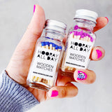 Colorful Wooden Matches In Little Glass Bottle 