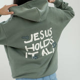 Jesus Holds It All Unisex Hoodie