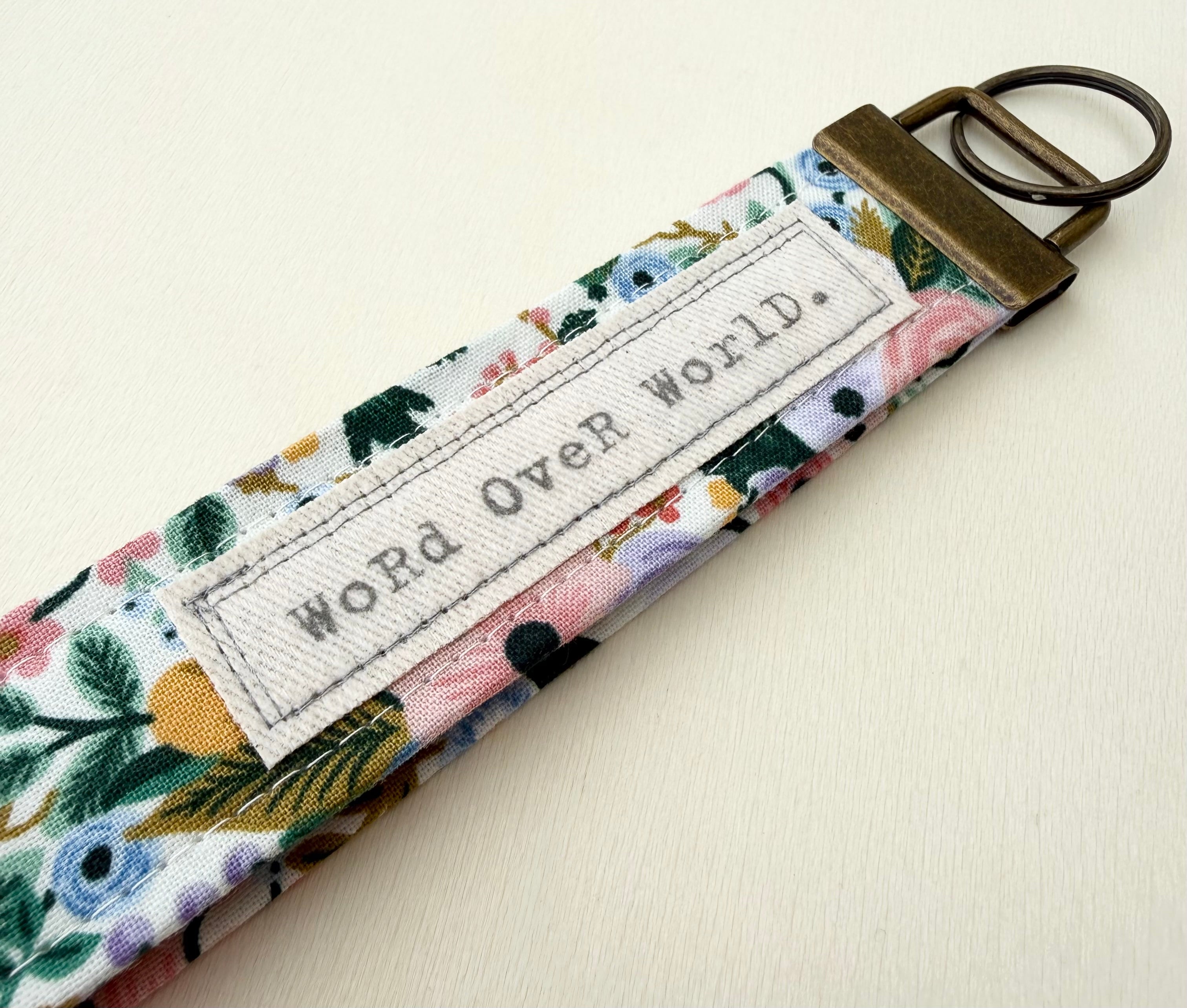 Word Over World - Words Matter Keychain