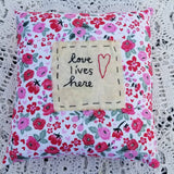 Hand-stitched Pillow - Love Lives Here